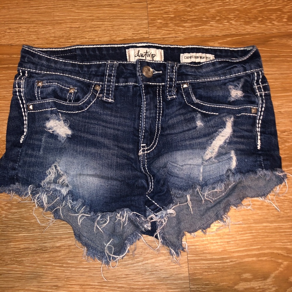 Distressed denim shorts